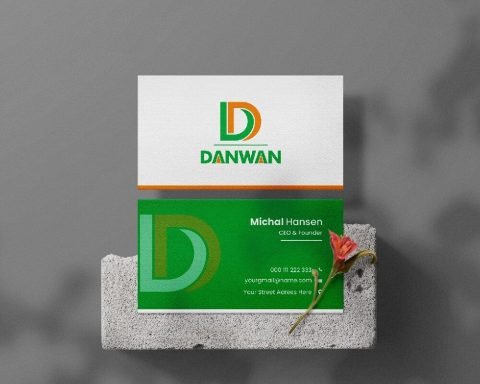 Danwan visiting card design front and back on a concrete block