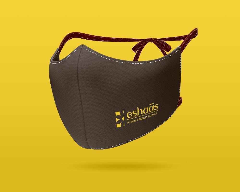 Brown face mask with Eshaas logo