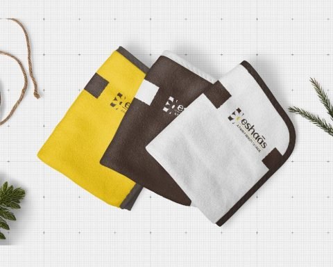 Eshaas branded salon towels in yellow, brown and white